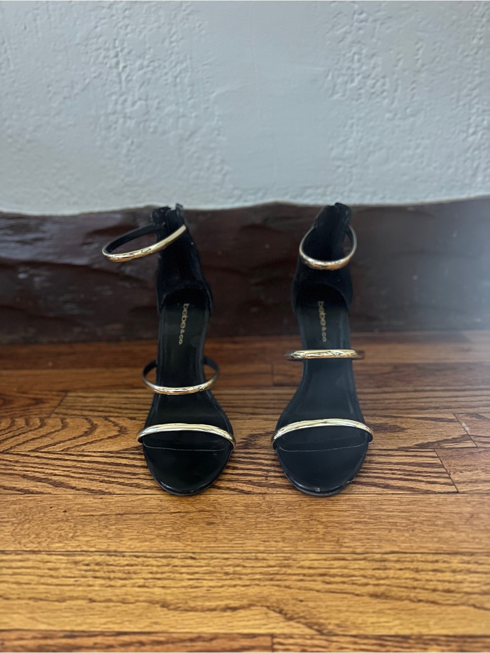 bebe Black and Gold Open-Toe Ankle Strap Heels